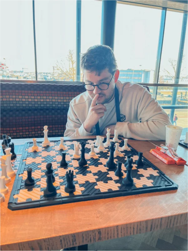 One guy acting smart while playing chess