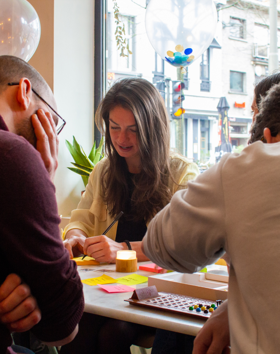 Three colleagues working together at a table